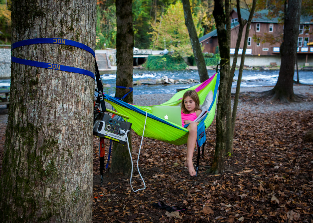 Abby working at online school at the Nantahala Outdoor Center. 